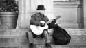 street-musician-playing-a-quitar